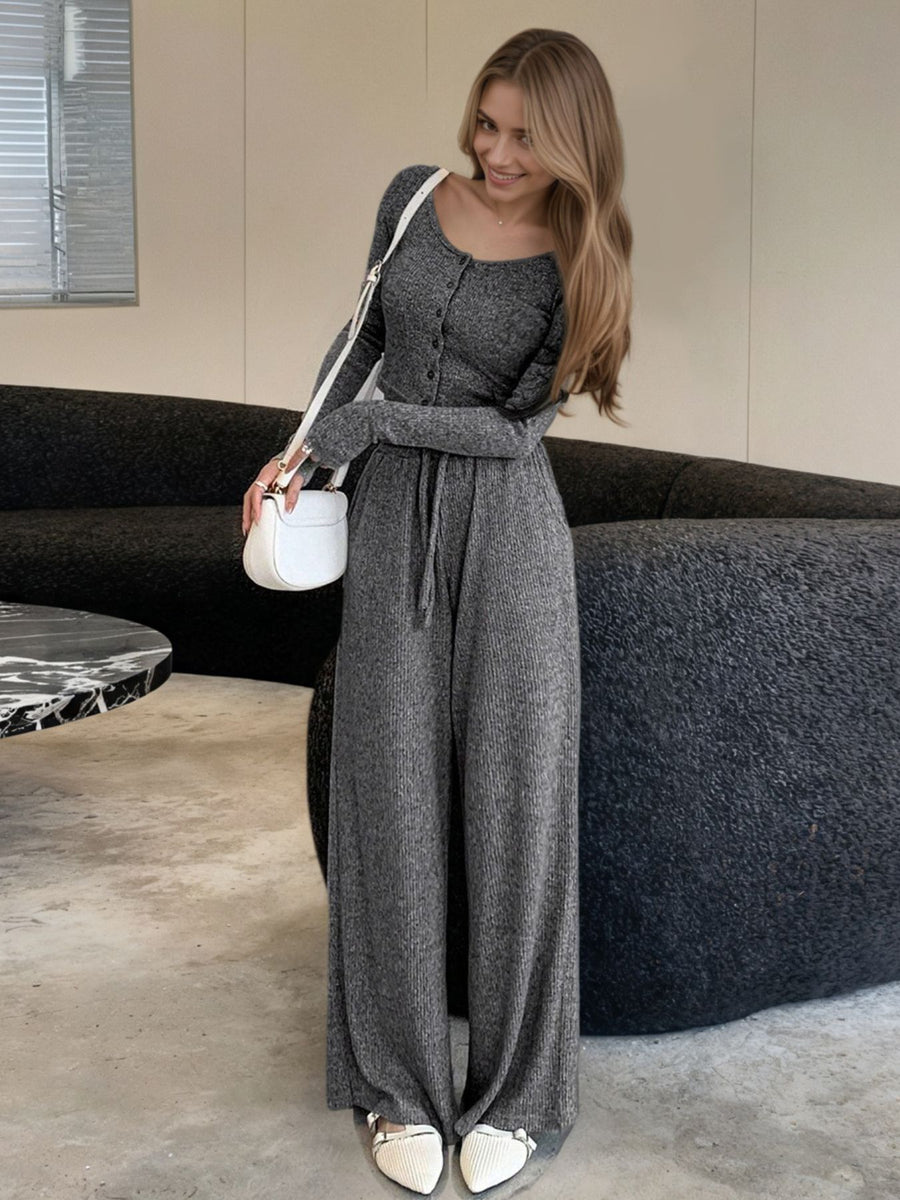 Gray ribbed knit button-down loungewear set with wide-leg pants and a drawstring waist.