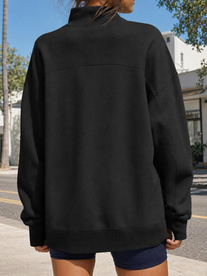 White oversized sweatshirt with mock neck