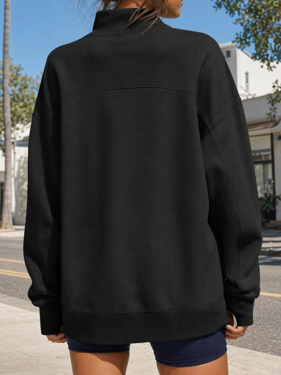 White oversized sweatshirt with mock neck