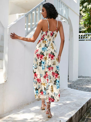 Floral midi dress with spaghetti straps and smocked bodice.