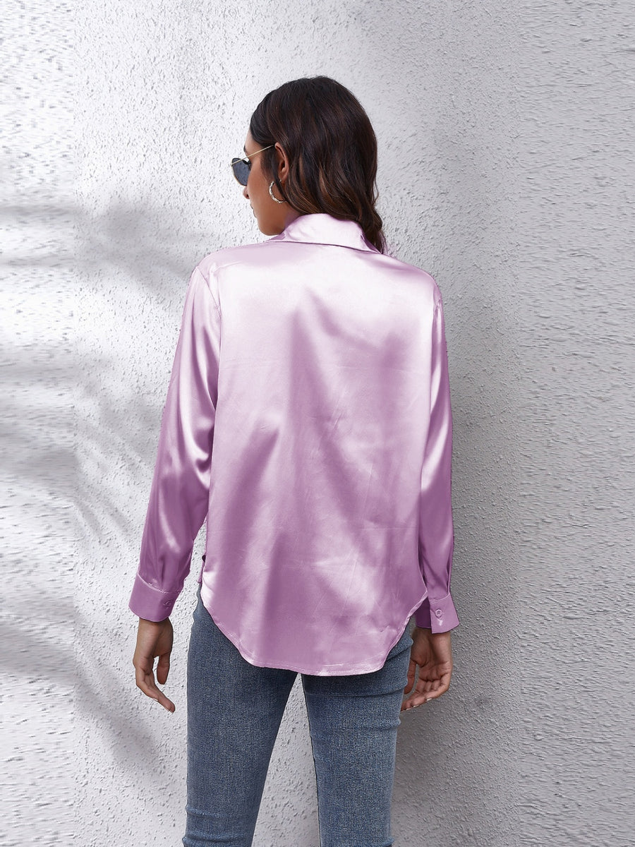 Lilac silky button-down shirt with long sleeves and a relaxed fit.