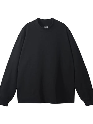 Black oversized crewneck long sleeve t-shirt with a mock neck detail.