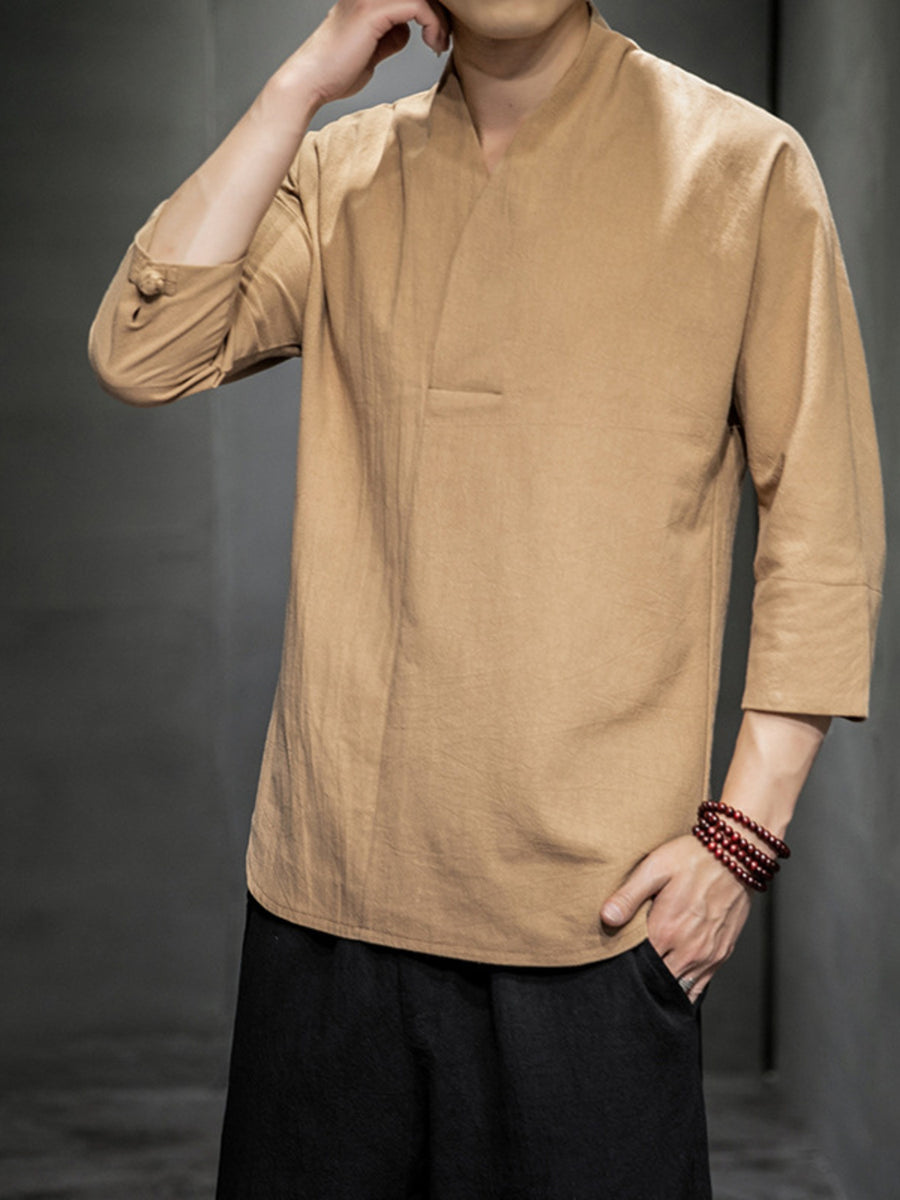 Men's tan 3/4 sleeve V-neck shirt with button detail on sleeve