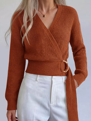 wrap sweater in rust featuring metal ring detail and regular fit