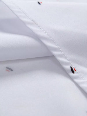button-up shirt in White with abstract print and button cuffs