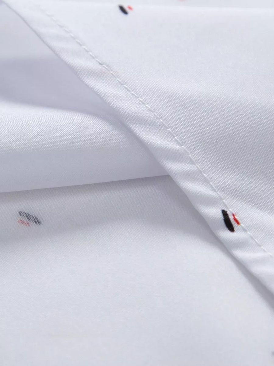 button-up shirt in White with abstract print and button cuffs
