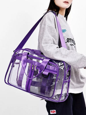 Clear duffel bag with purple trim and straps, featuring mesh pockets and dual zippers.