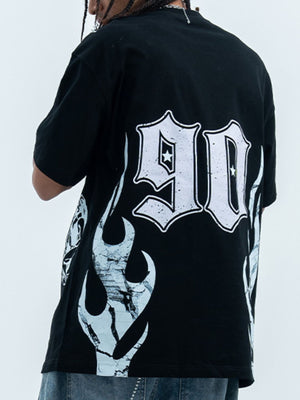 Black cotton graphic t-shirt with oversized fit, crew neck, and white '90' graphic with flame details.