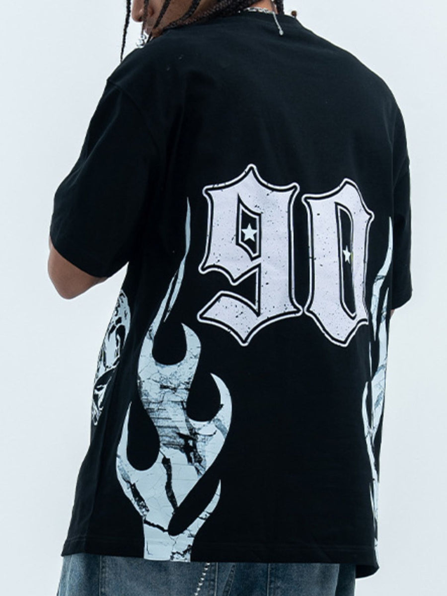 Black cotton graphic t-shirt with oversized fit, crew neck, and white '90' graphic with flame details.