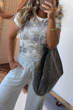 Women's slim-fit crew neck t-shirt with abstract woodland print in grey and white.