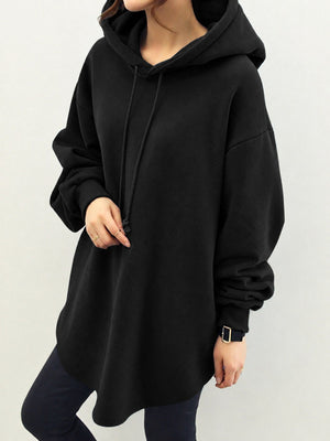 pullover hoodie in black featuring drawstring and oversized fit