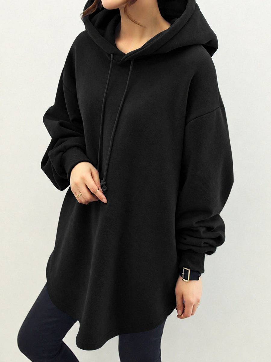 pullover hoodie in black featuring drawstring and oversized fit