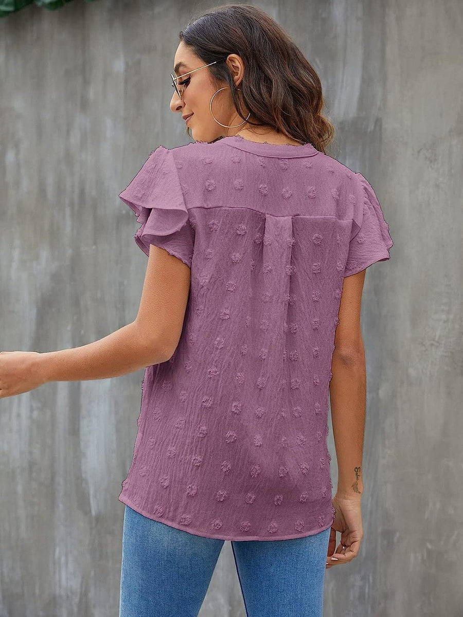 Flutter sleeve Swiss dot blouse in Lavender with ruffled sleeves and a buttoned back detail.