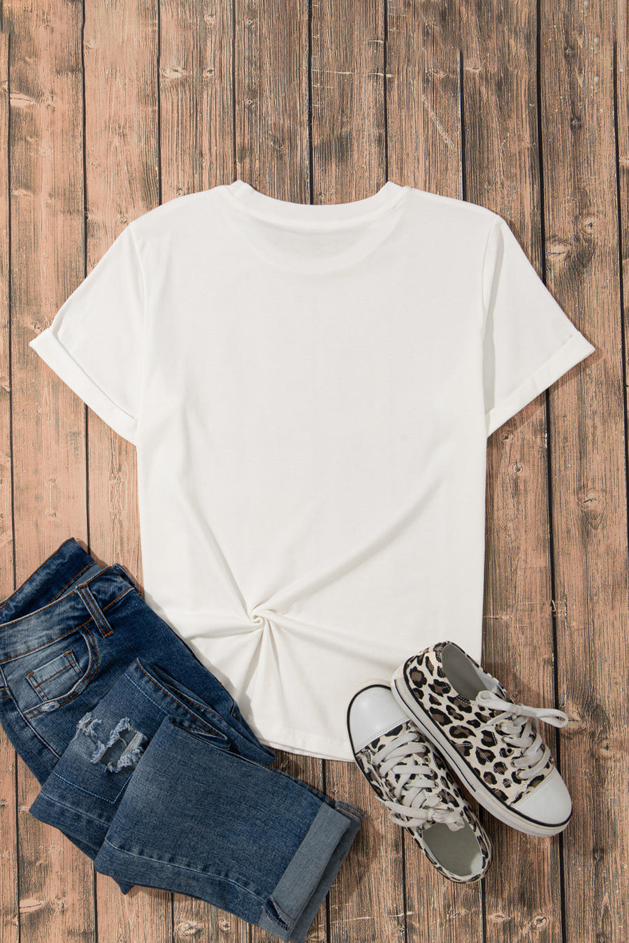 White basic tee with twisted hem and cuffed sleeves