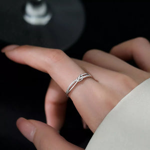 ring in silver featuring knot detail and fitted fit