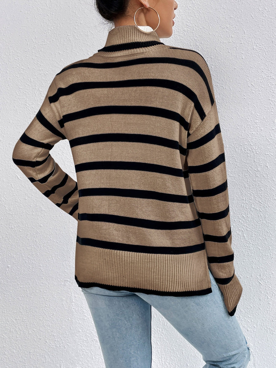Oversized camel and black stripe turtleneck sweater with ribbed cuffs and hem.