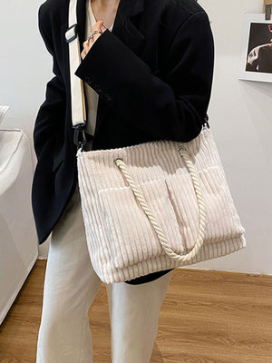 cream handbag