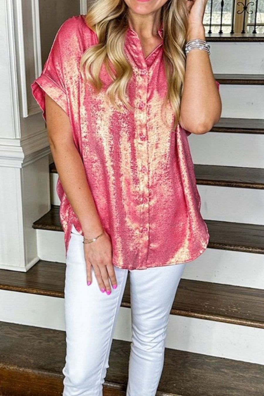 Metallic finish dusty pink oversized button-down blouse with short sleeves.