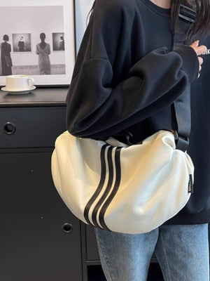 Medium Oxford cloth crossbody bag in off-white with black stripes