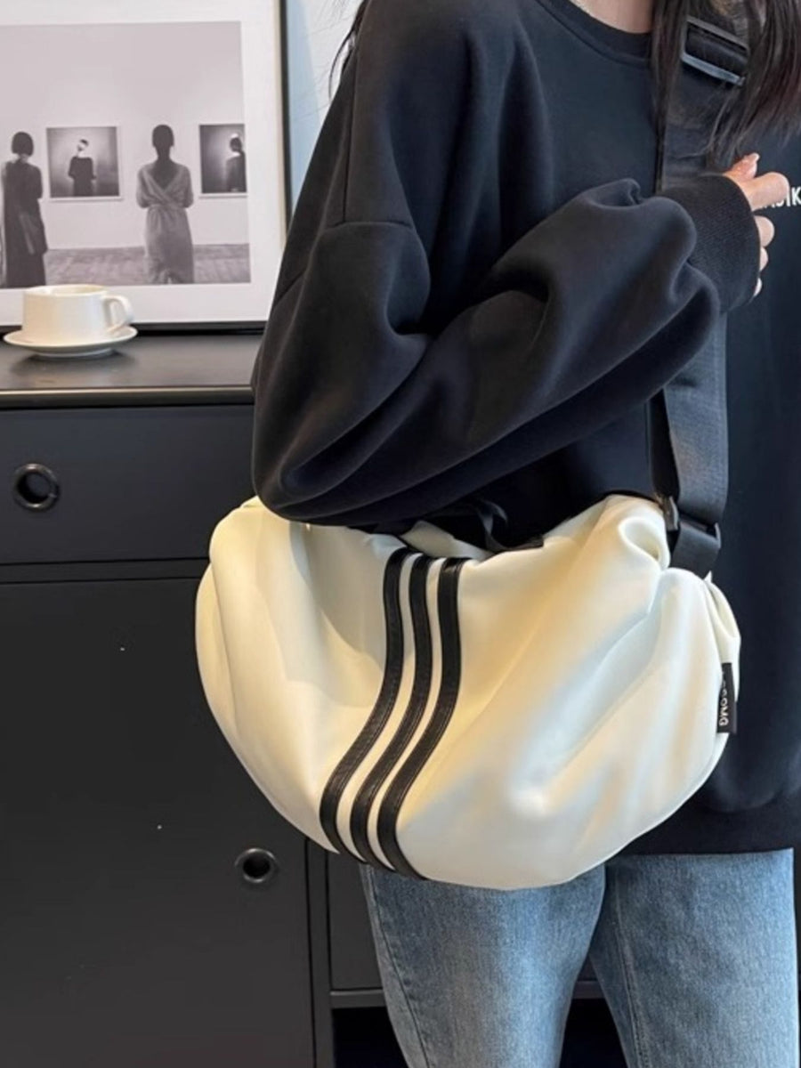 Medium Oxford cloth crossbody bag in off-white with black stripes