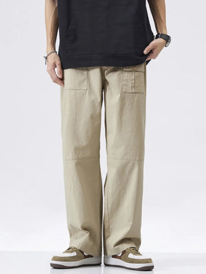 Khaki relaxed fit cargo pants with button flap pockets and a straight leg.