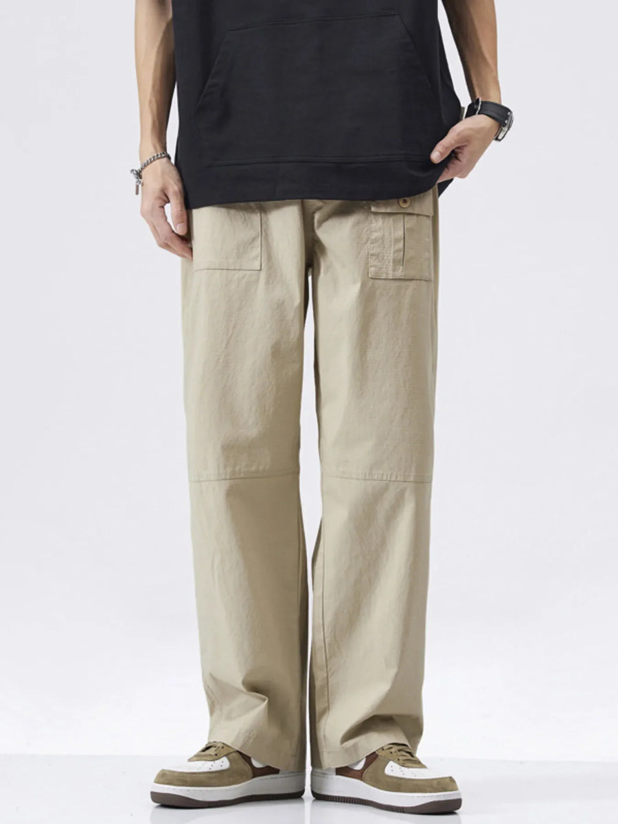 Khaki relaxed fit cargo pants with button flap pockets and a straight leg.