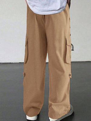 Brown cargo pants with multiple pockets and drawstring hems.