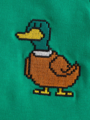 Green baby tee with pixelated duck graphic embroidery