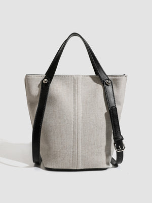 Canvas Bucket Handbag Tote Bag With Leather Straps in light beige with adjustable strap