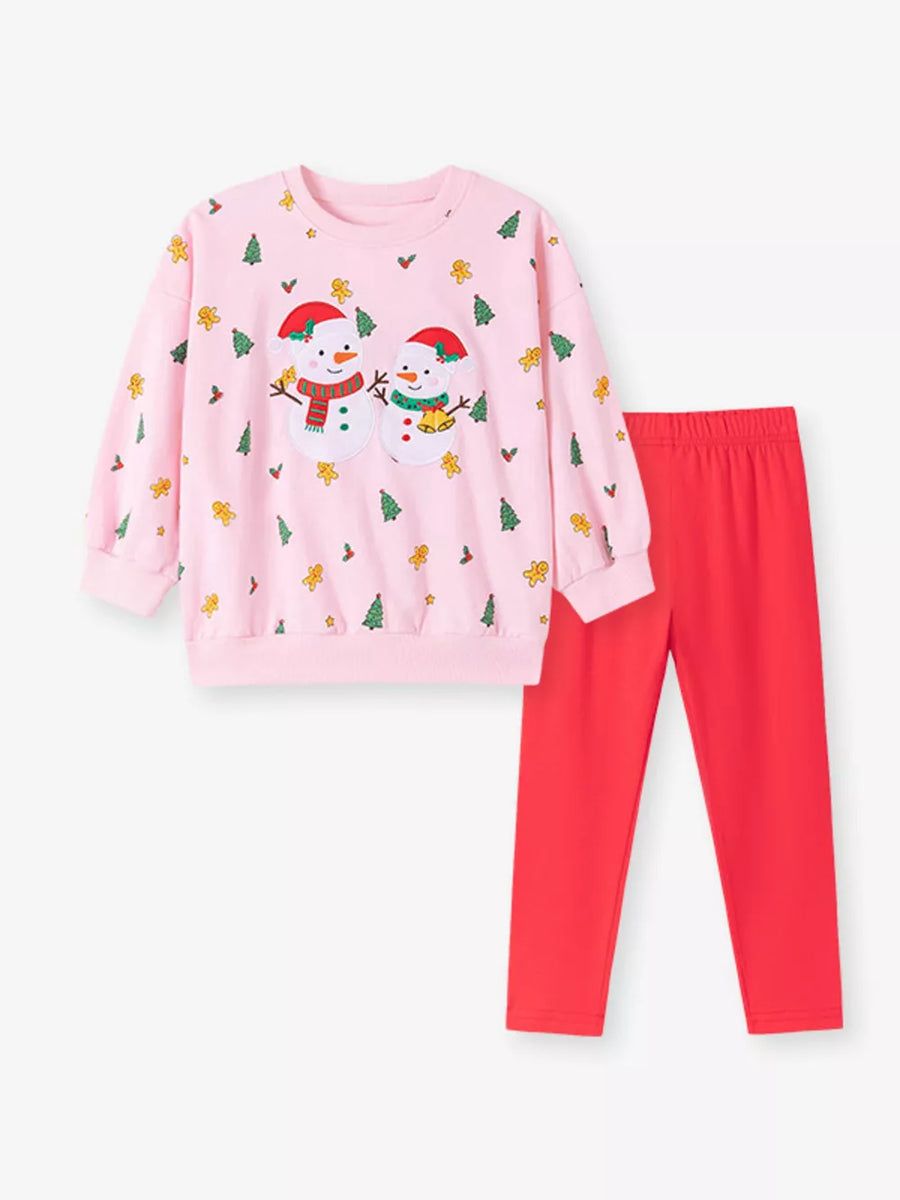 red sweatshirt featuring ribbed cuffs and christmas print