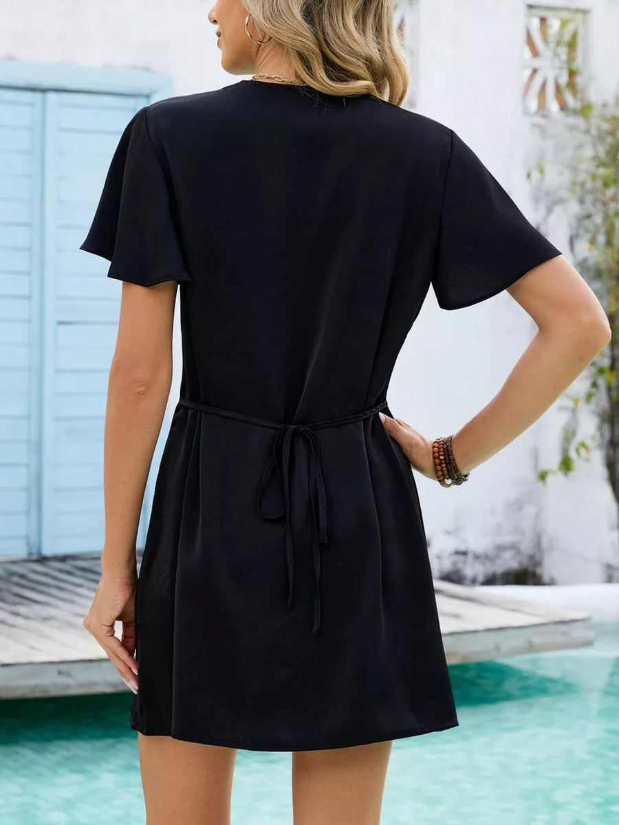 Black notched flutter sleeve mini dress with tie waist