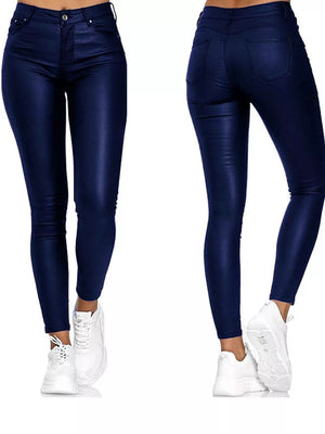 Blue high-waisted faux-leather skinny pants with a button and zipper closure.