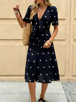 Navy blue daisy print midi dress with tie-front and short sleeves