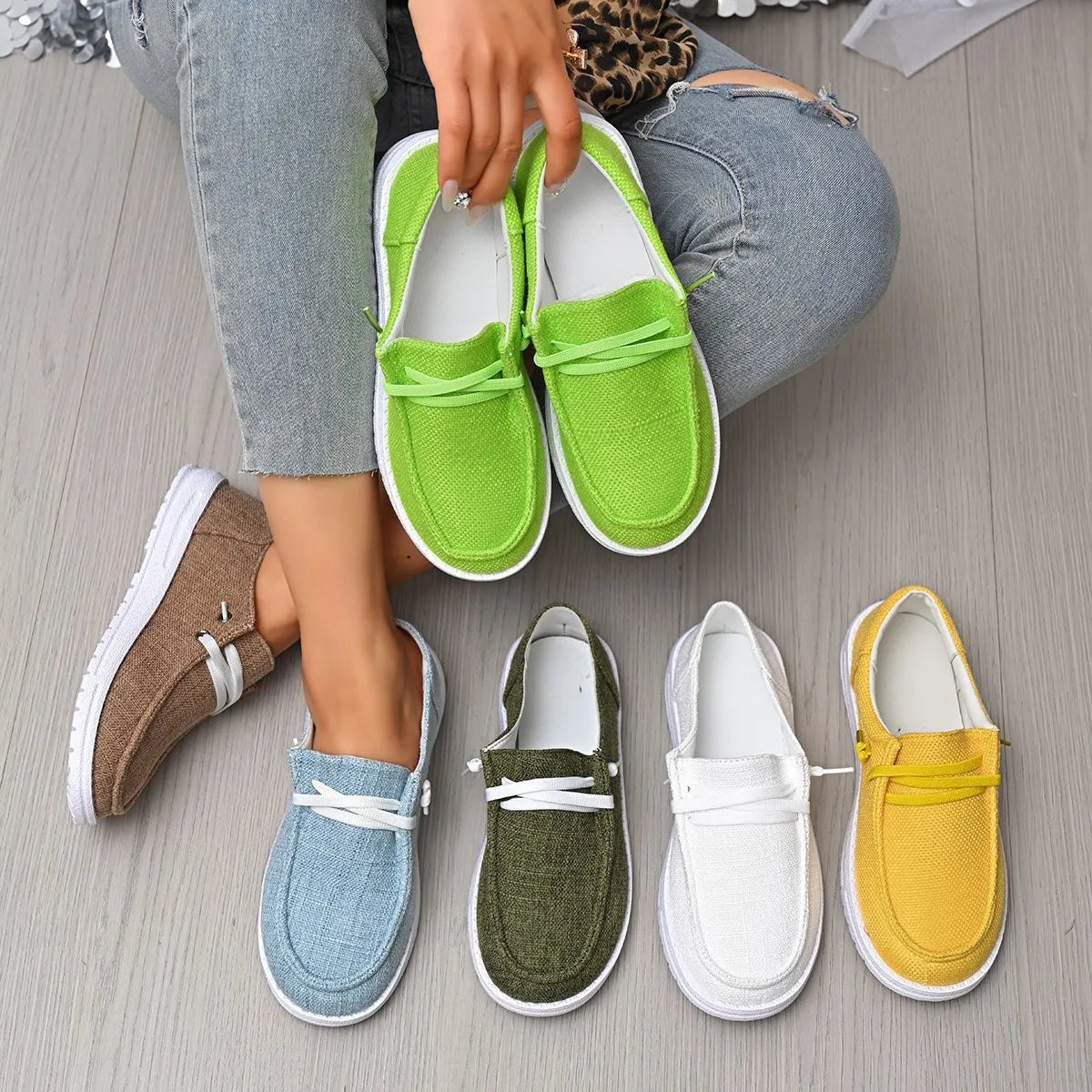 Linen-blend boat shoes in lime, taupe, dusty blue, army green, white, and gold with contrast soles.