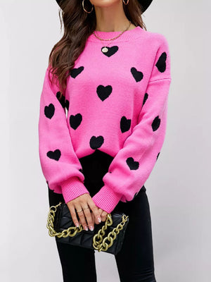 black pullover sweater featuring ribbed and heart-print