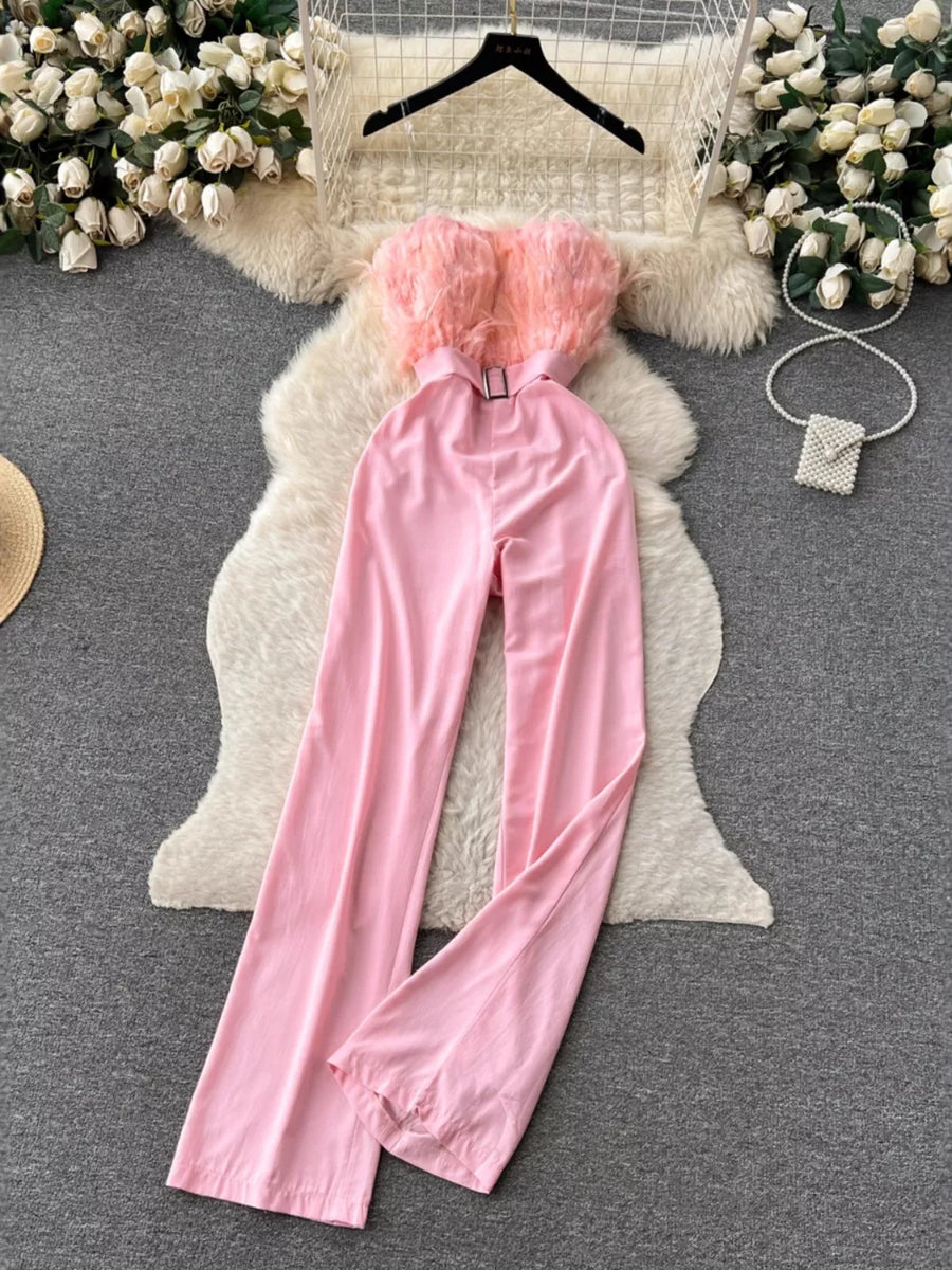 Pink feather trim strapless wide-leg jumpsuit with belt detail