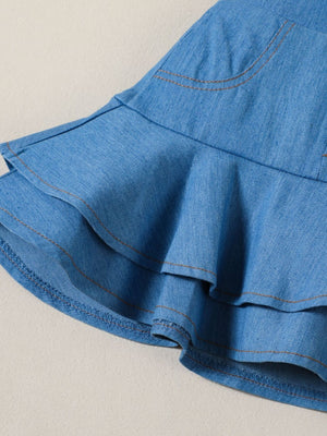 Denim skirt with tiered ruffles and contrast stitching.