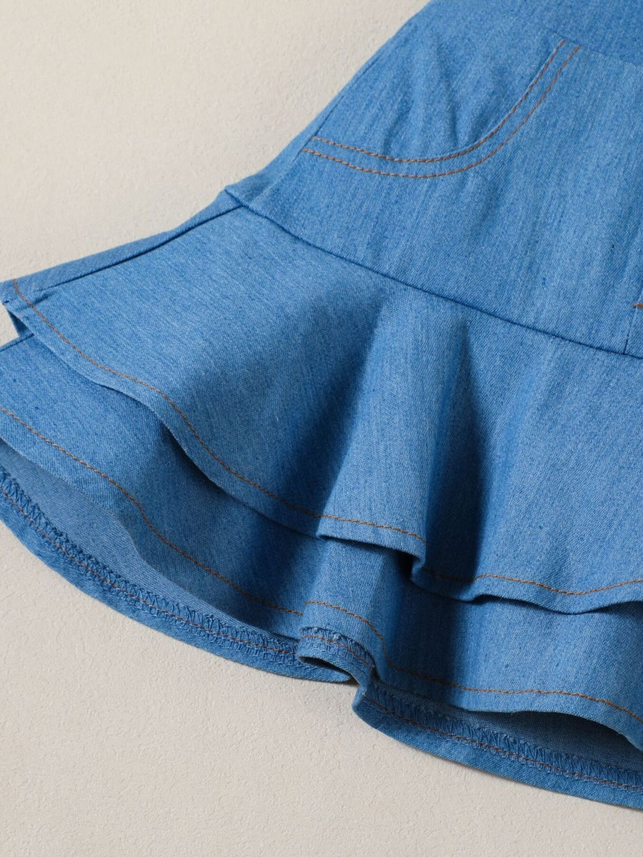 Denim skirt with tiered ruffles and contrast stitching.