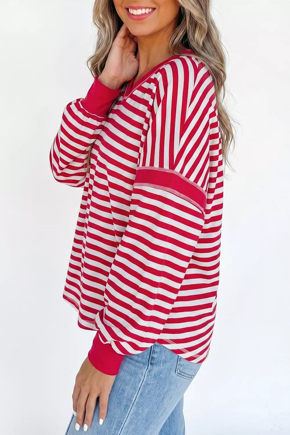 red sweatshirt with hip-length and pullover