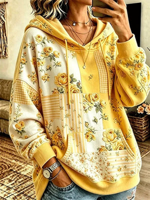 100% polyester Care instructions: Machine wash cold pullover hoodie in Yellow with relaxed silhouette