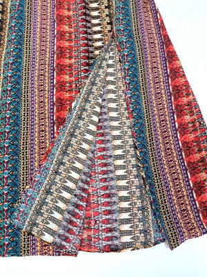 Bohemian maxi dress with colorful tribal print and high slit