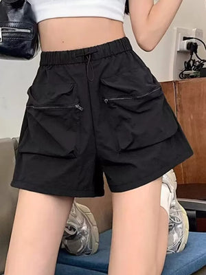 Black cargo shorts with adjustable drawstring and zippered pockets.