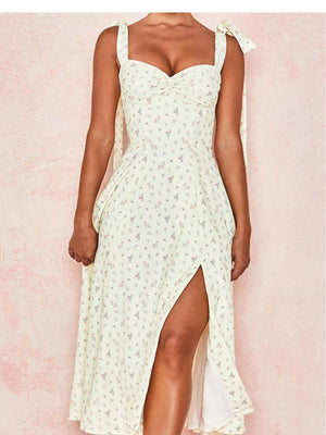 Cream floral tie shoulder midi dress with sweetheart neckline and high slit.