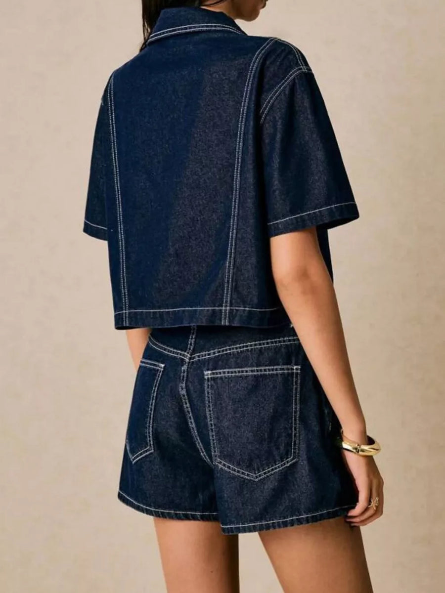 Dark blue cotton cropped button-up top and skort set with contrast stitching.