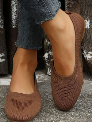 Knit ballet flats in dark brown with subtle heart detail, comfortable slip-on style.