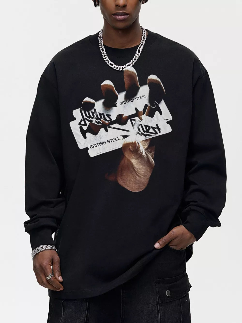 Black long sleeve tee with bold British Steel graphic on a razor blade.