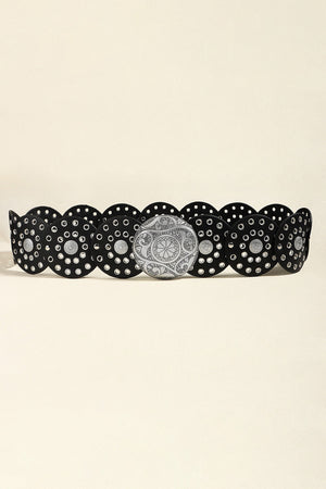 Black belt with silver disc embellishments and a large ornate silver buckle.