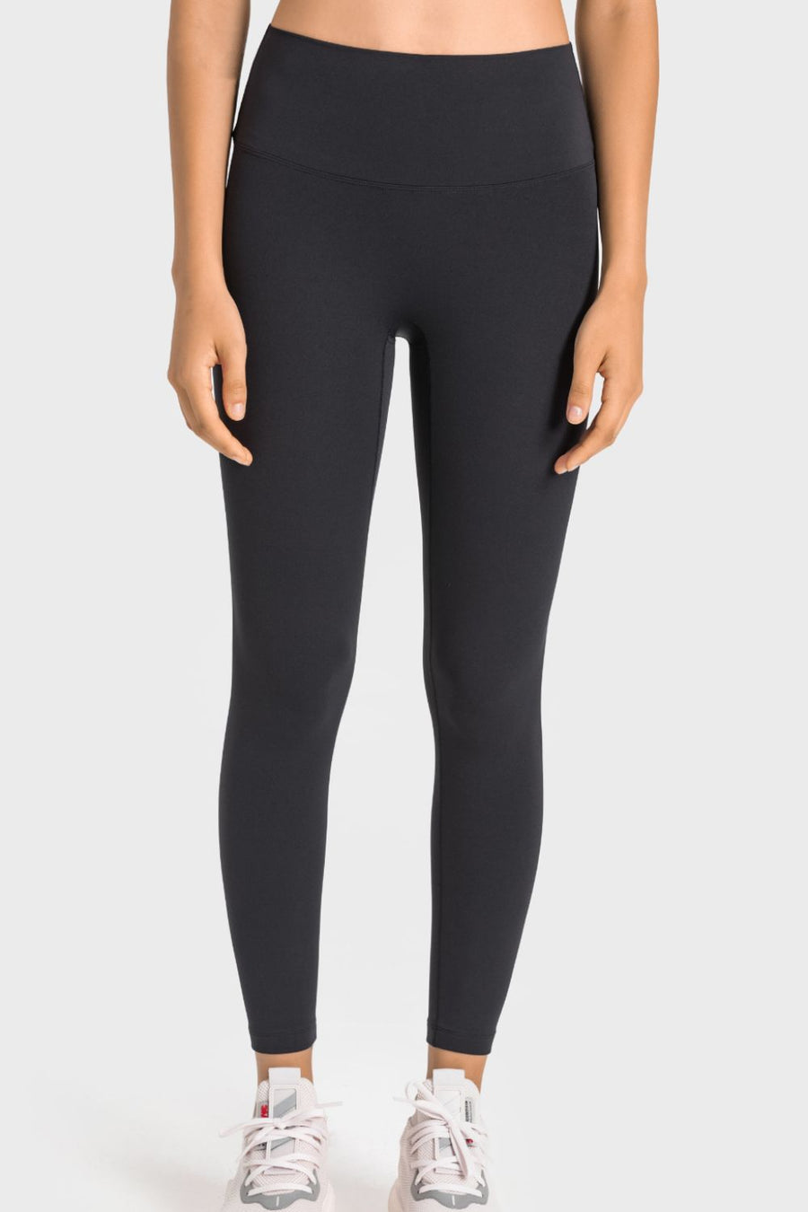 Black seamless high-waist performance leggings with a smooth finish.