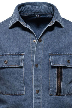 Light blue denim shirt with buttoned chest pockets, one featuring a zip detail.