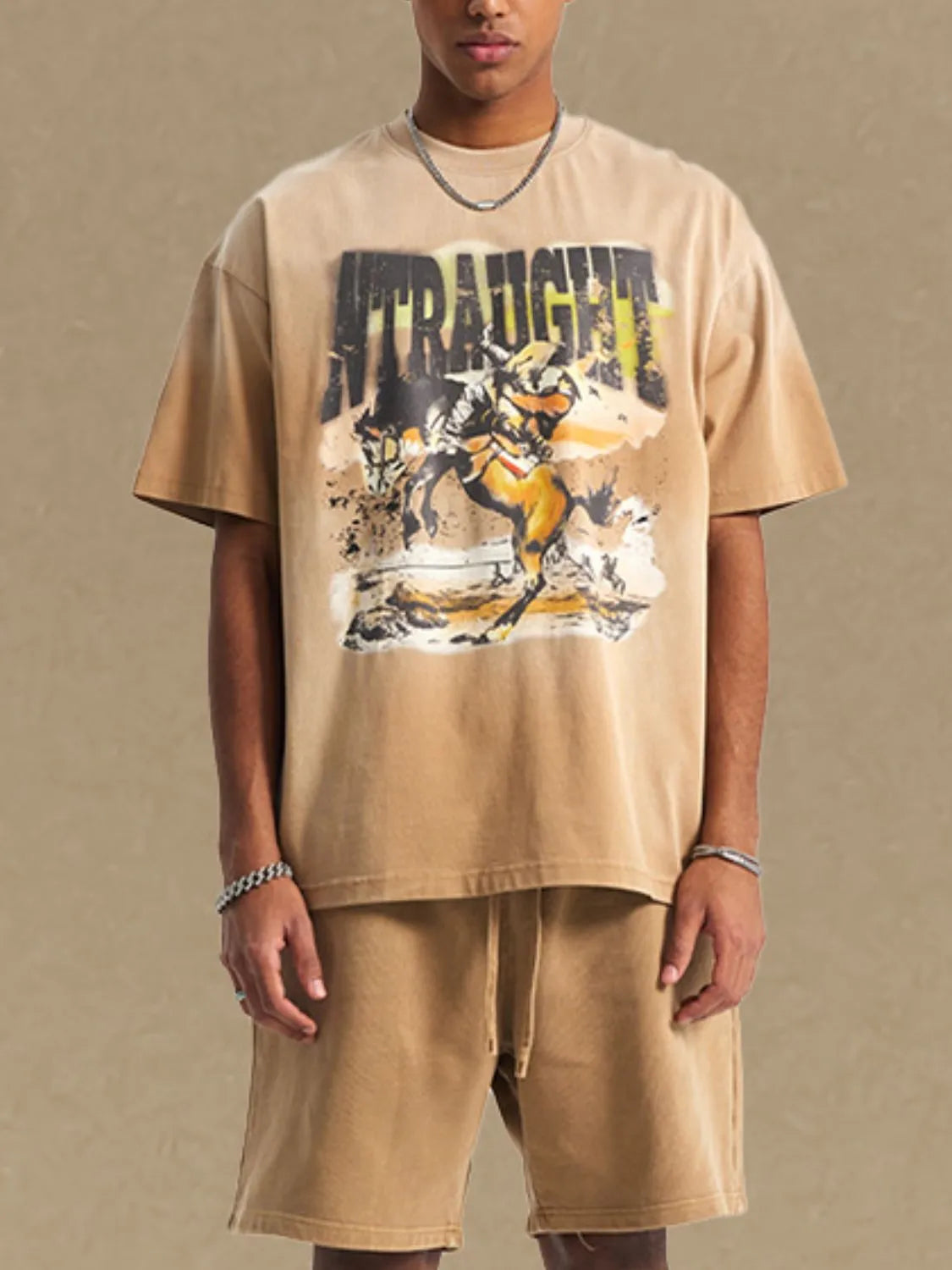 Vintage graphic oversized tee in khaki with a cowboy on a horse print and distressed details.